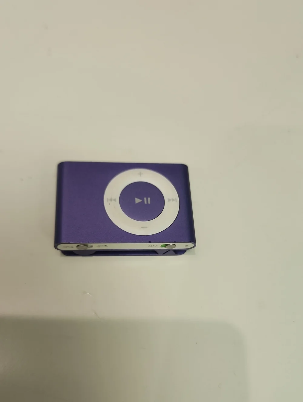 Apple iPod Shuffle 2nd Generation in purple.
